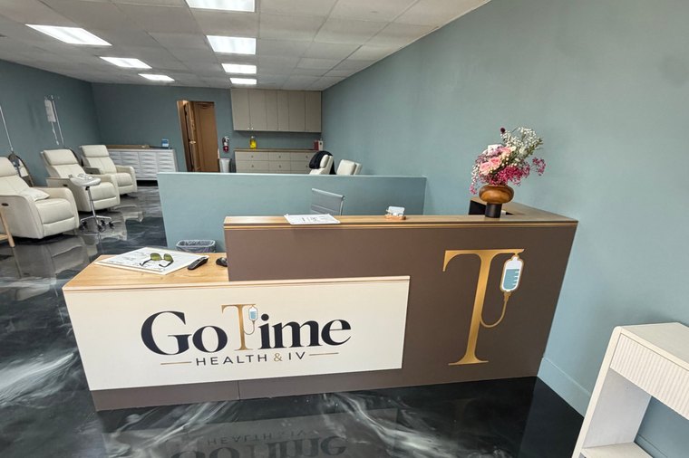 Inside the Old Town Temecula clinic: treatment recliners along one wall and the reception desk