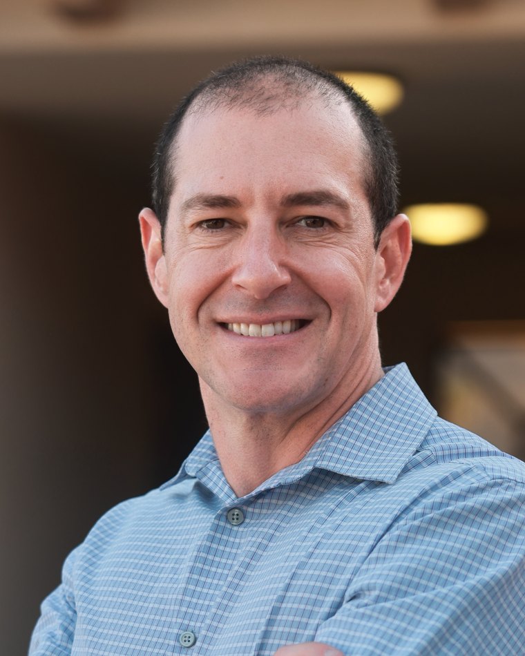 Peter O'Brien, NP, founder of GoTime Health & IV, in scrubs